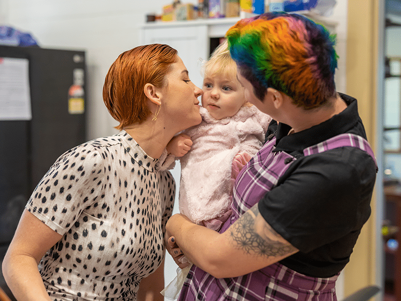 LGBTQIA2S+ couple with child
